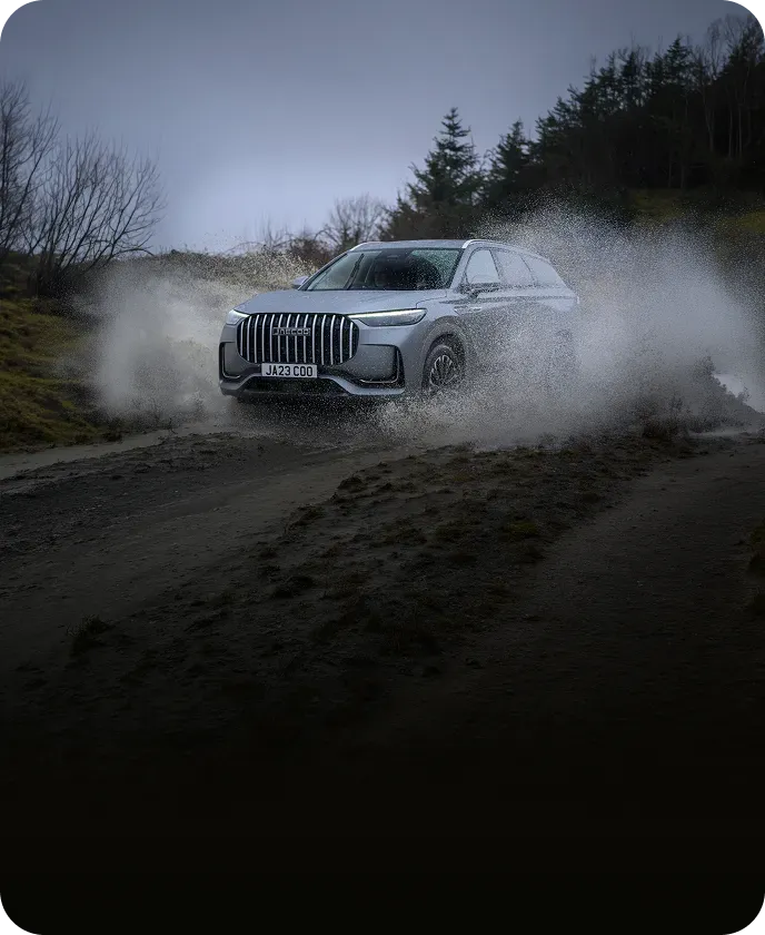 JAECOO vehicle driving through water